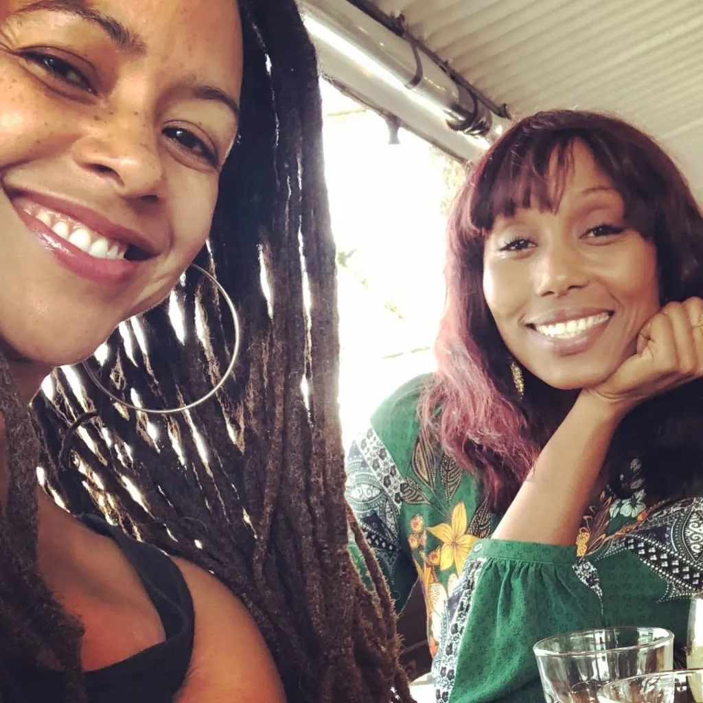 Miss Renee Simone with Folami of Chic on a Byron Bay patio