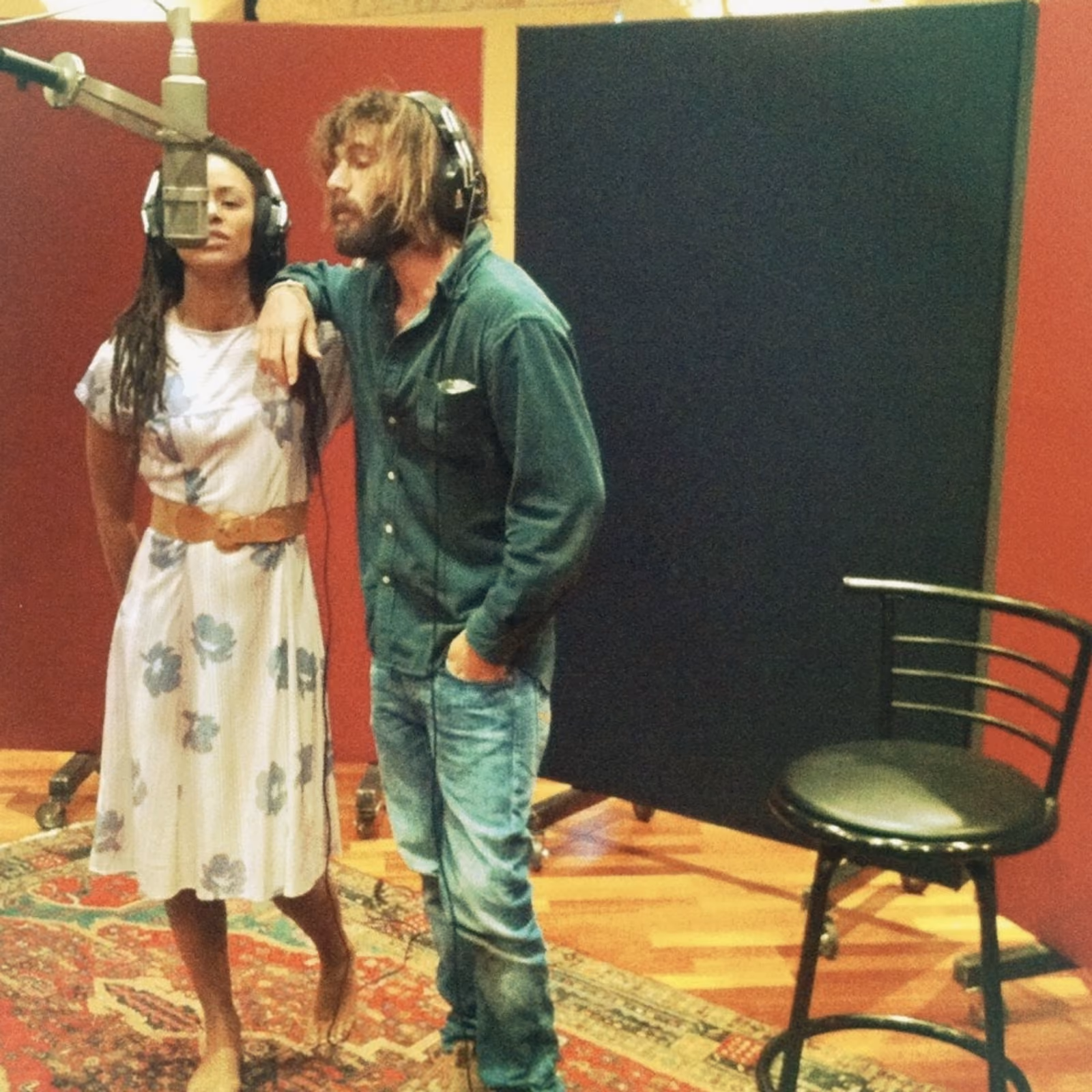 Miss Renee Simone and Angus Stone at the microphone in the recording studio
