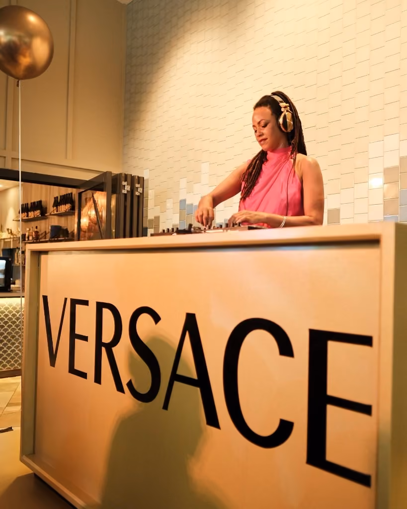 Miss Renee Simone at the decks for a Versace brand night